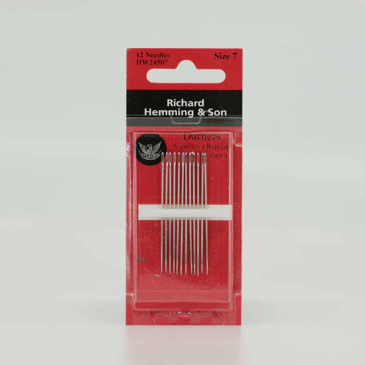 Sewing, embroidery and darning needles in needle box